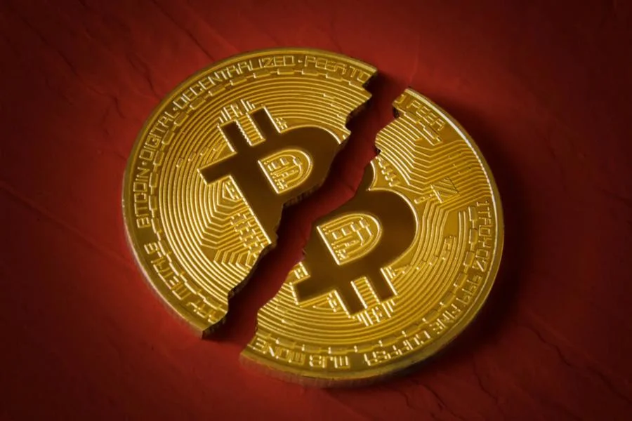 Binance Hacking Fears Spark Crypto Rout as Bitcoin Breaks Below $79,000